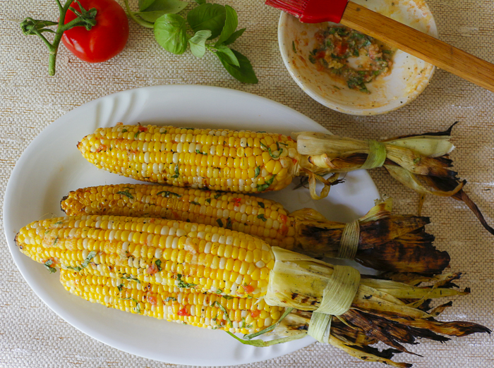 Add sliced basil to the tomato butter, baste and enjoy