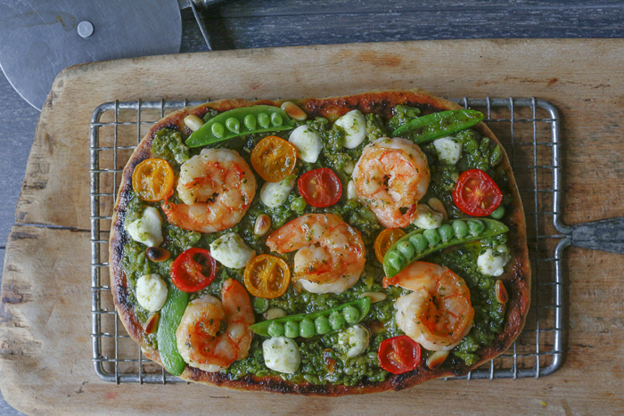 This special pesto is used as a base on Naan Bread (or Pizza) -top with some Shrimp, Goat Cheese, Tomatoes and some Sugar Snap Peas