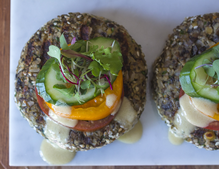 These burgers are great served "open-faced" with stacks of veggies and some microgreens 