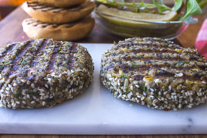 The grilled burgers up close: roll the edges in sesame and hemp seeds for fiber and flavor