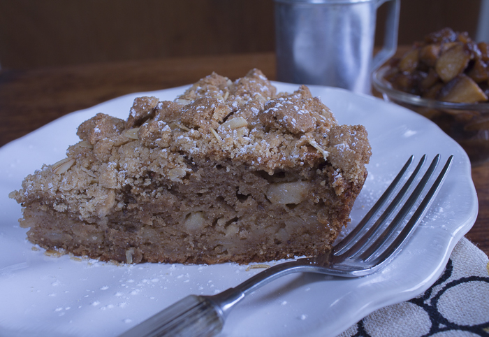 A slice up close dotted with chunks of apples