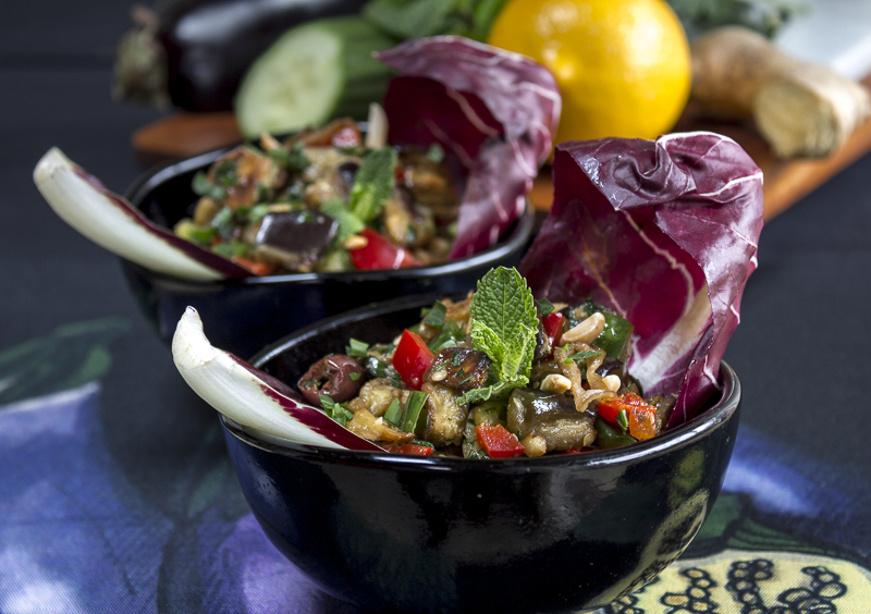 Roasted Eggplant Salad in black glass bowls with a Meyer Lemon-Ginger Dressing