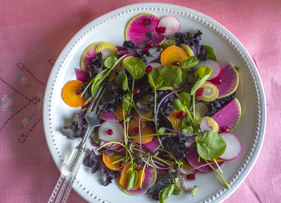 A beautiful mix of Greens, Watermelon Radish, Carrots, Microgreens and Pomegranate Seeds