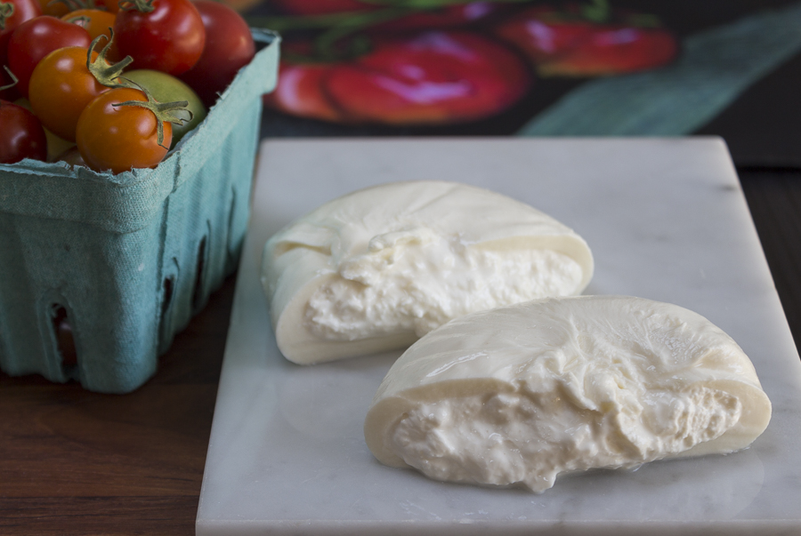 The wonderful interior of Burrata - mozzarella style on the outside, creamy ricotta texture on the inside