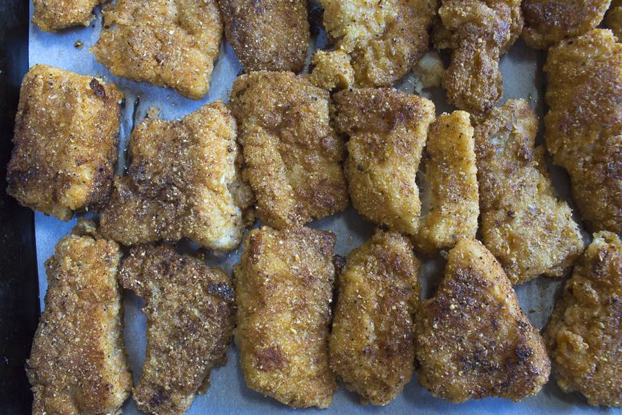 Crispy Fish, marinated in spiked buttermilk, coated with organic cornmeal is pan fried and served with a delicious Succotash