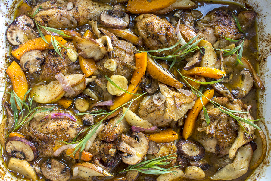 Halfway through cooking, the butternut squash, mushrooms and pears are added