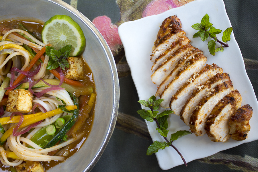 A comforting bowl of noodles with loads of vegetables, tofu, chicken and fabulous Indian flavors