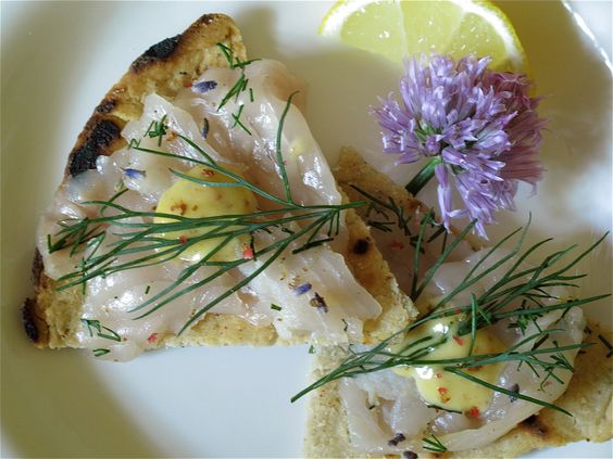 Flavor the flesh of Wild Caught Alaskan Salmon with Lavender, Dill, Vodka and Pink Peppercorns. An elegant gravlax that also can be prepared with any fresh salmon.