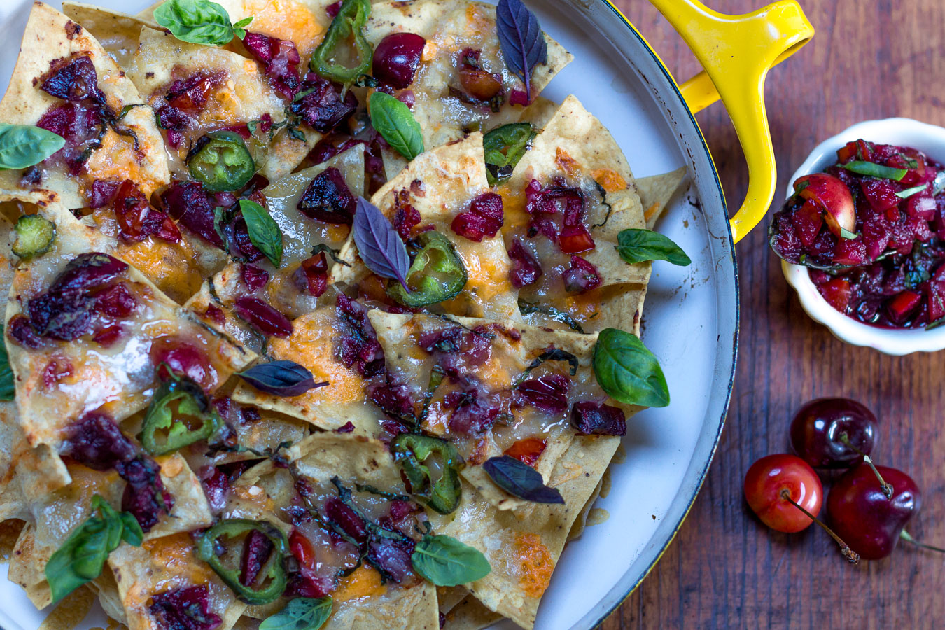 Layer the cherry salsa with the tortilla chips and cheeses and bake