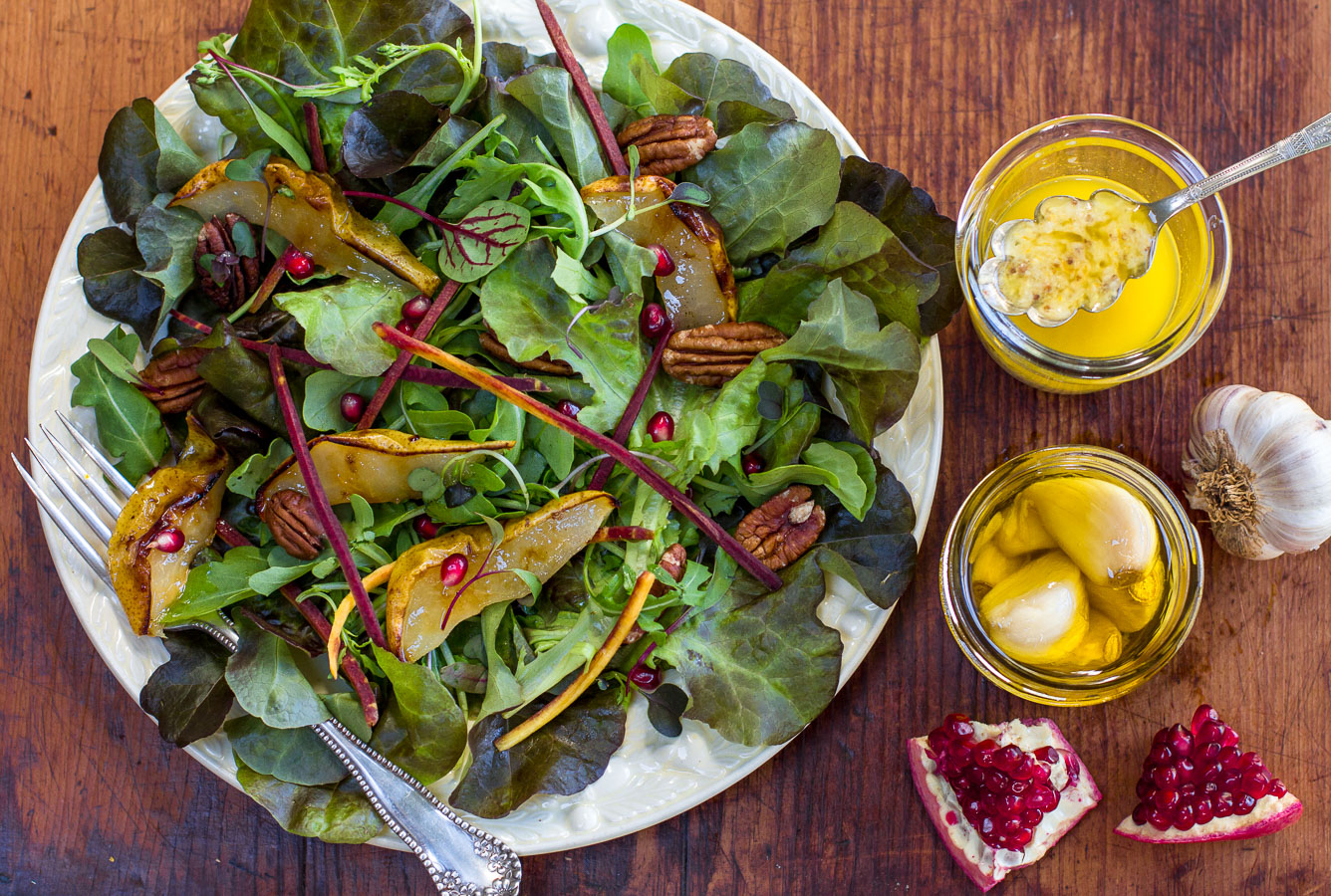 Fall Salad with Pears, Pomegranate Seeds and Zesty Garlic Confit Vinaigrette