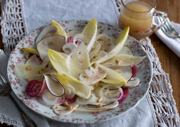 A beautiful, crispy and crunchy salad with Winter-White Vegetables. Chioggia Beets add a touch of crimson color, as does the rind of the Pears and Black Radish.