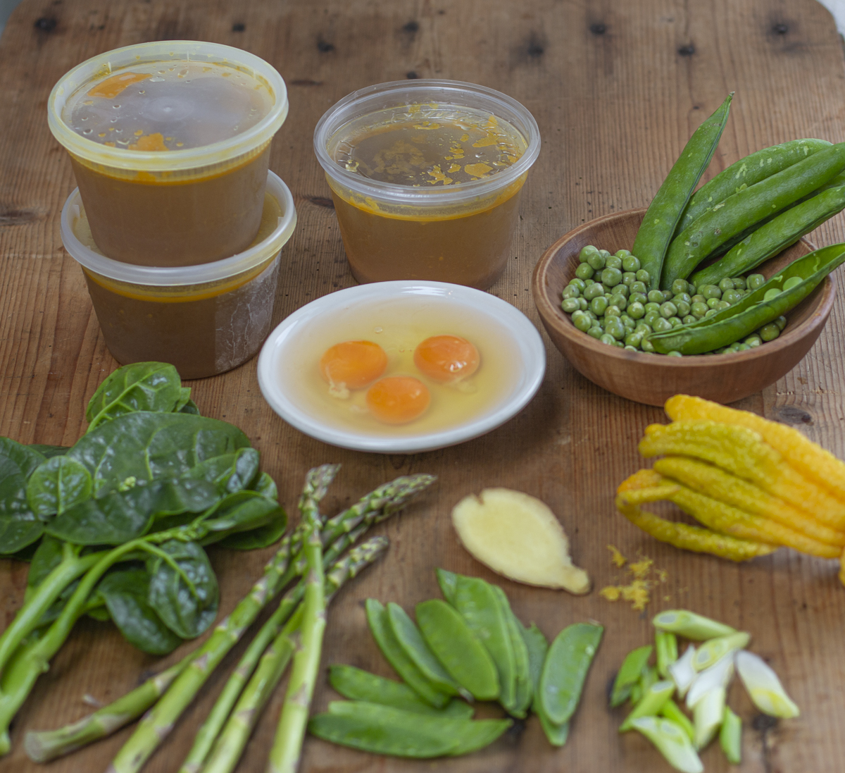 Ingredients for the Spring Egg Drop Soup on a wooden board