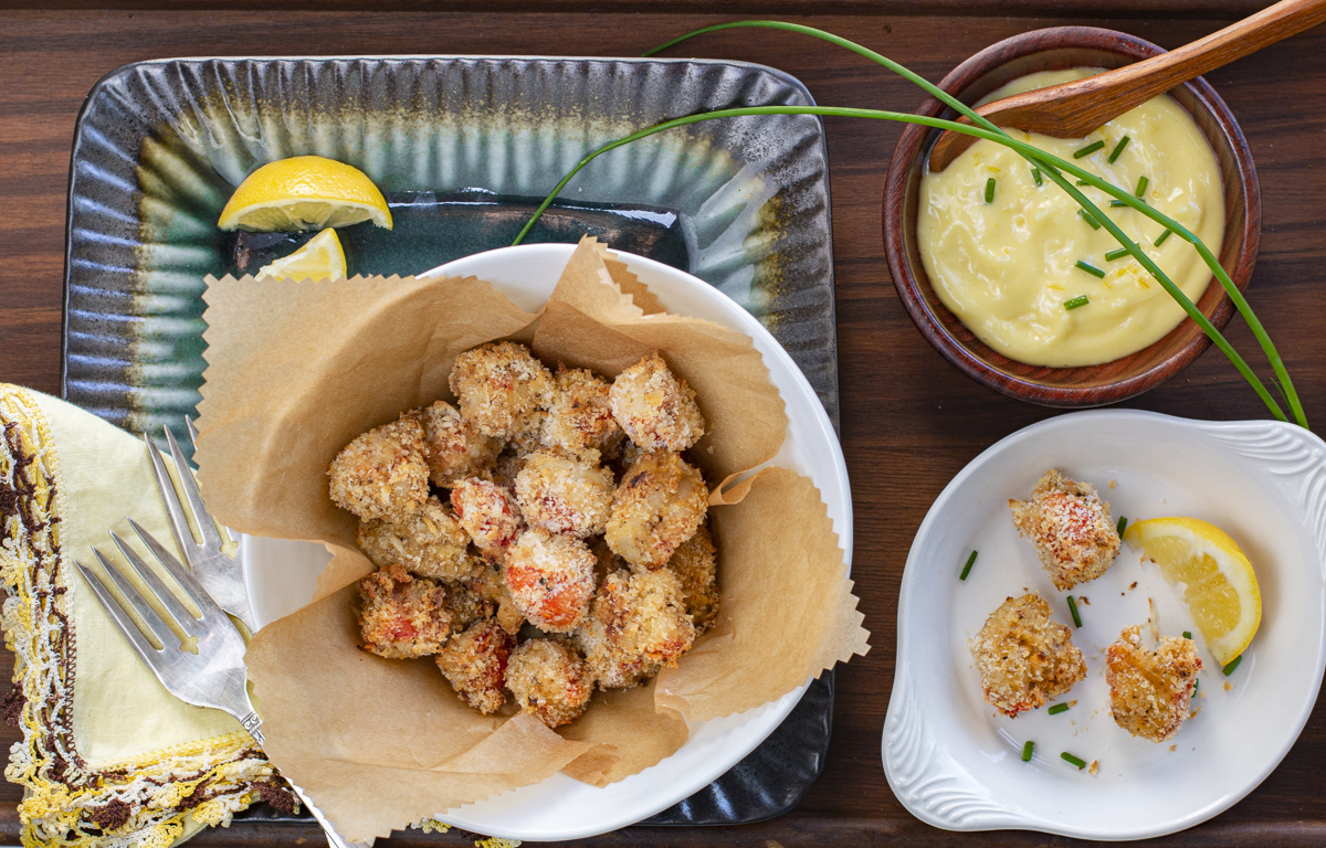 Homemade Panko Popcorn Spiced Shrimp in parchment lined white bowl