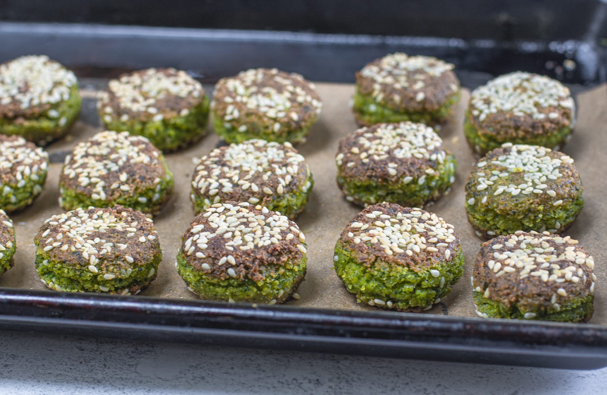 Cooked falafel on a baking pan