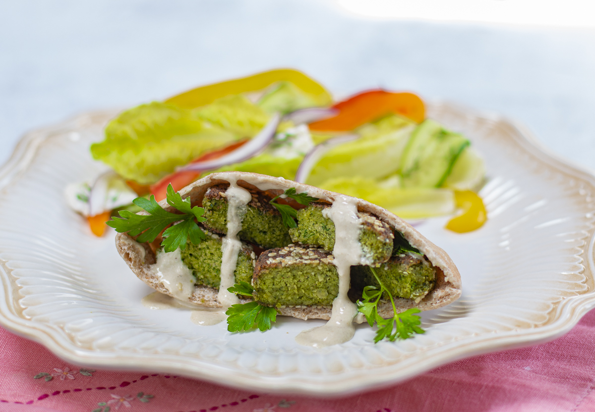 Sesame Coated Falafel in Pita Bread with Tahini Sauce