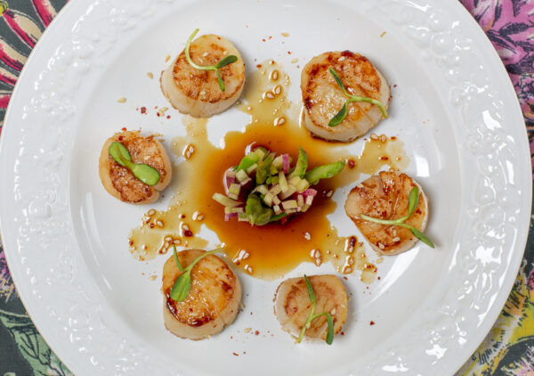 Seared Scallops with Karen's Zesty Ponzu Sauce on embossed white plate