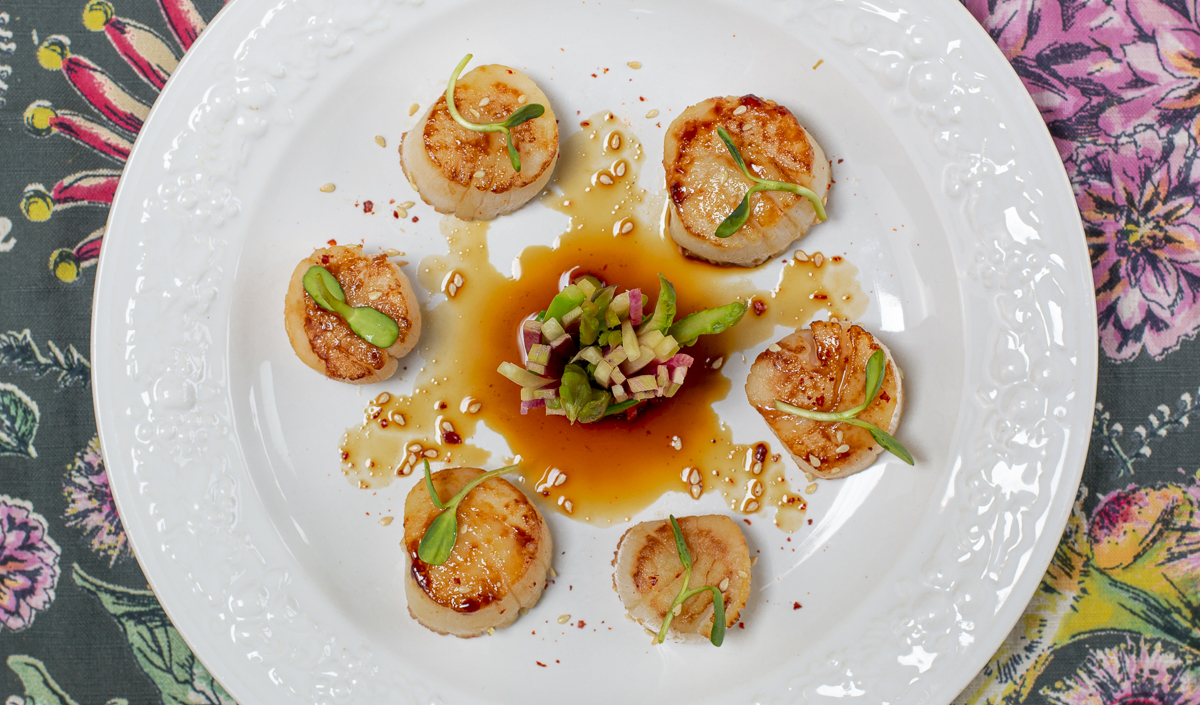 Seared Scallops with Karen's Zesty Ponzu Sauce on embossed white plate 
