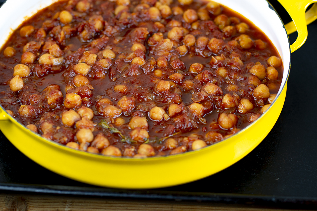Add chickpeas in sauce to a baking dish - bake uncovered for 30 minutes 