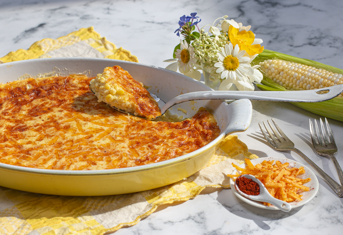 corn pudding with cheddar & chipotle crust in vintage casserole