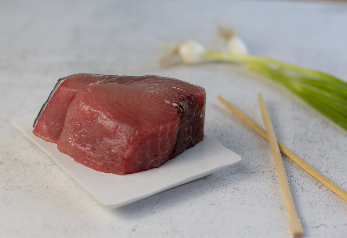 Sushi Grade Ahi Tuna on white plate 