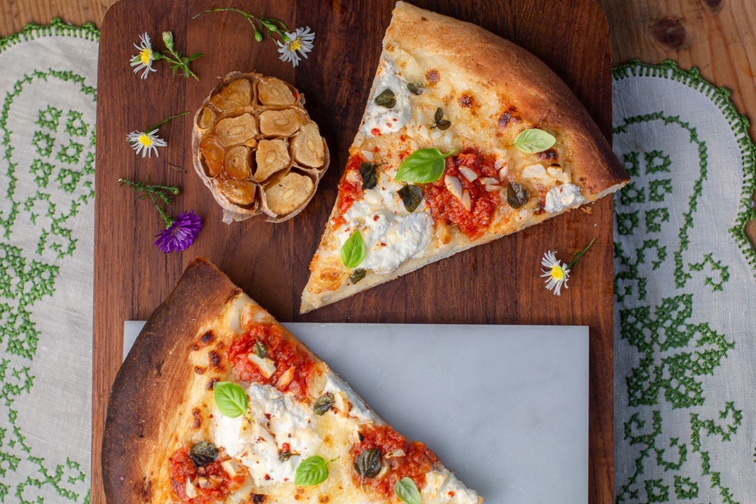 Garlic Pizza with head of roasted garlic