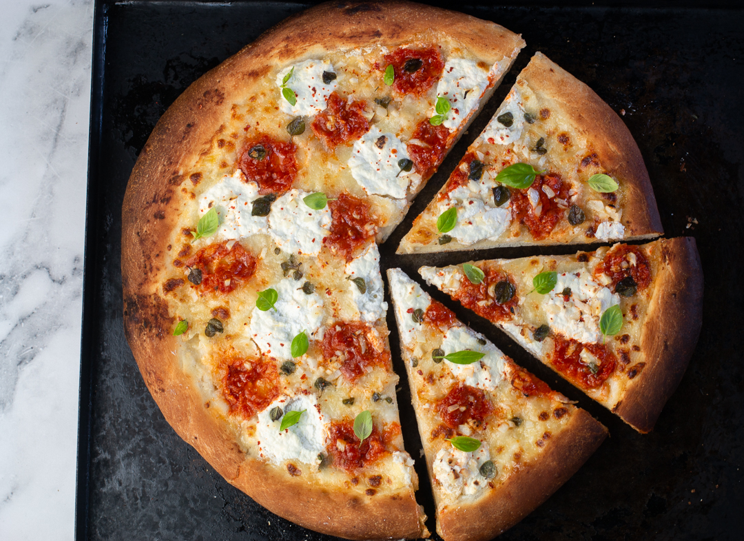 Garlic Pizza with Dollops of Ricotta Cheese, Marinara Sauce, Basil - and lots of Garlic! 