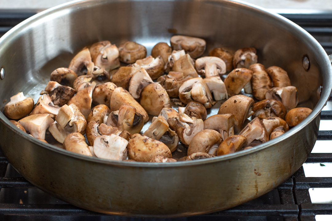 Mushrooms first get a sauté in olive oil until golden around the edges