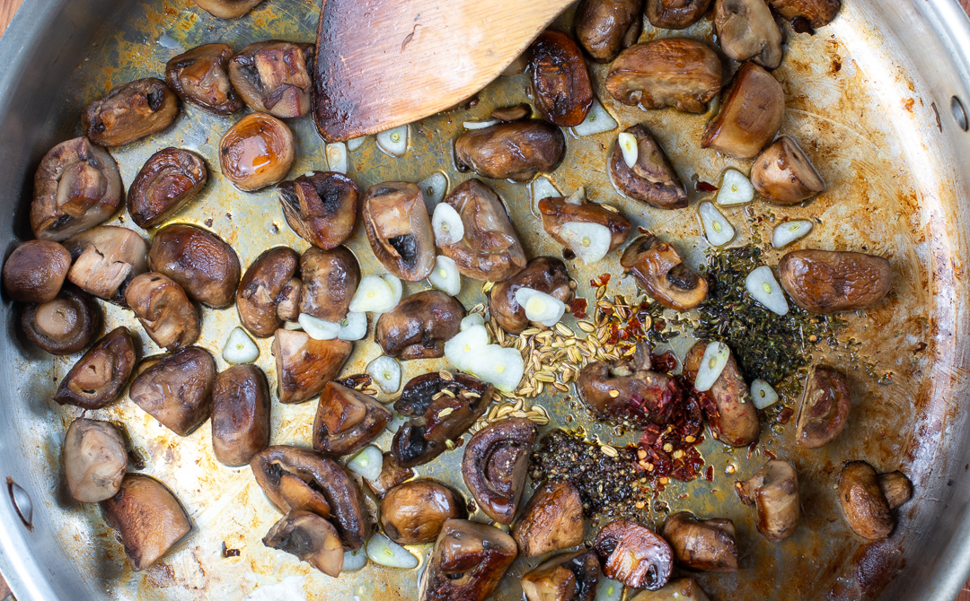 Add flavorings to the skillet to toast - Fennel seeds, chili flakes, oregano, thyme and cracked pepper