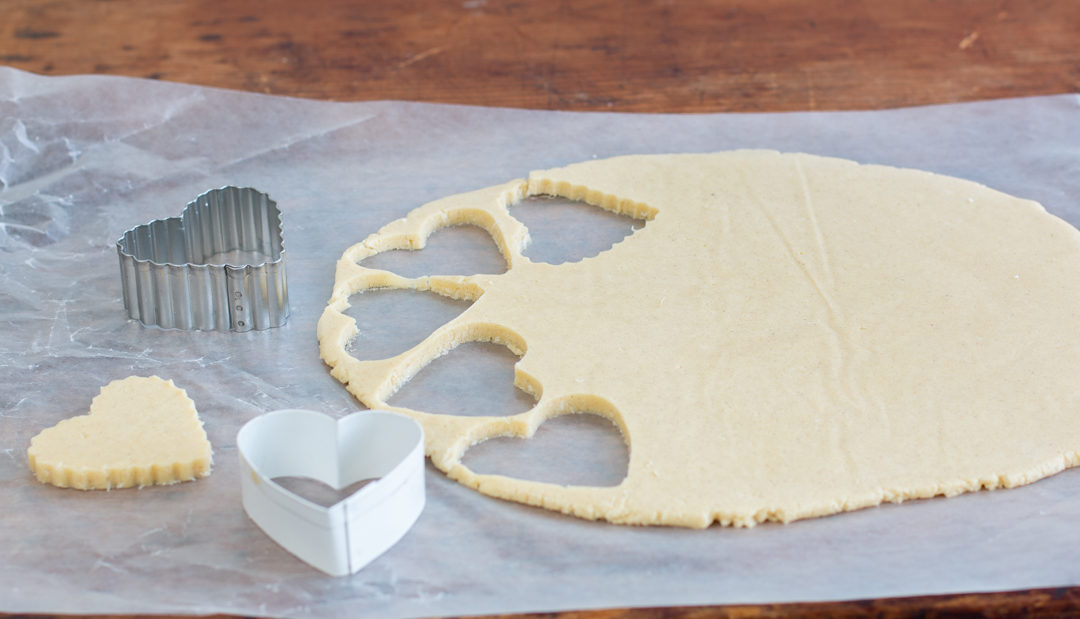 Cut heart shapes out of the rolled, cold dough - re-roll all scraps.