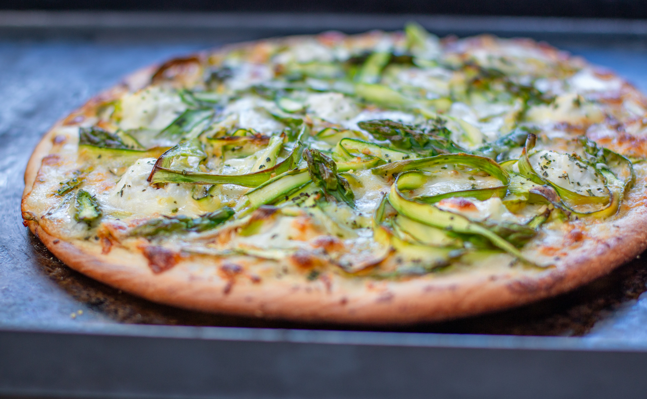 Wow! See the texture of all those shaved asparagus spears swirled on top of the pizza
