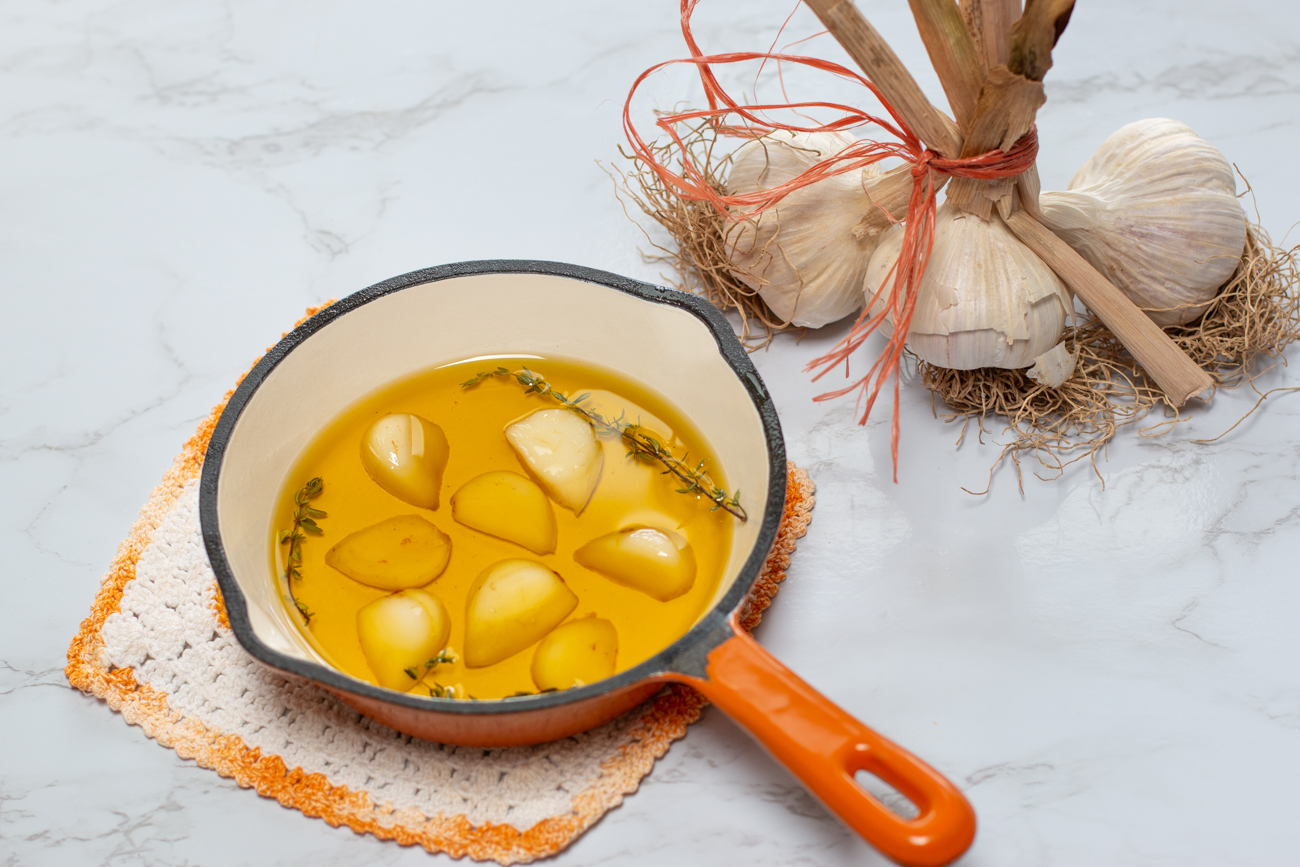 Cook Garlic cloves in Olive Oil until softened - the flavorful oil will be used in the sauce 