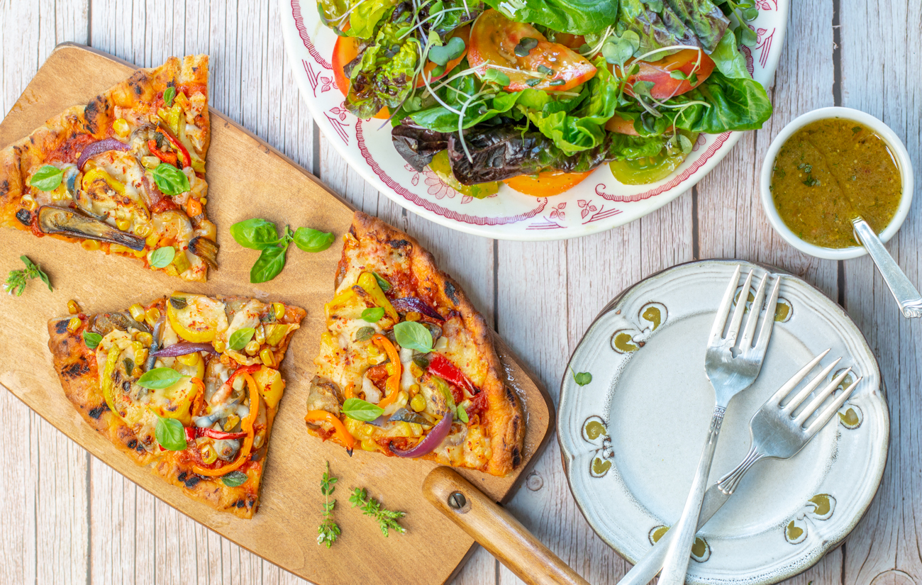 Serve the pizza with a simple salad including Heirloom Tomatoes 