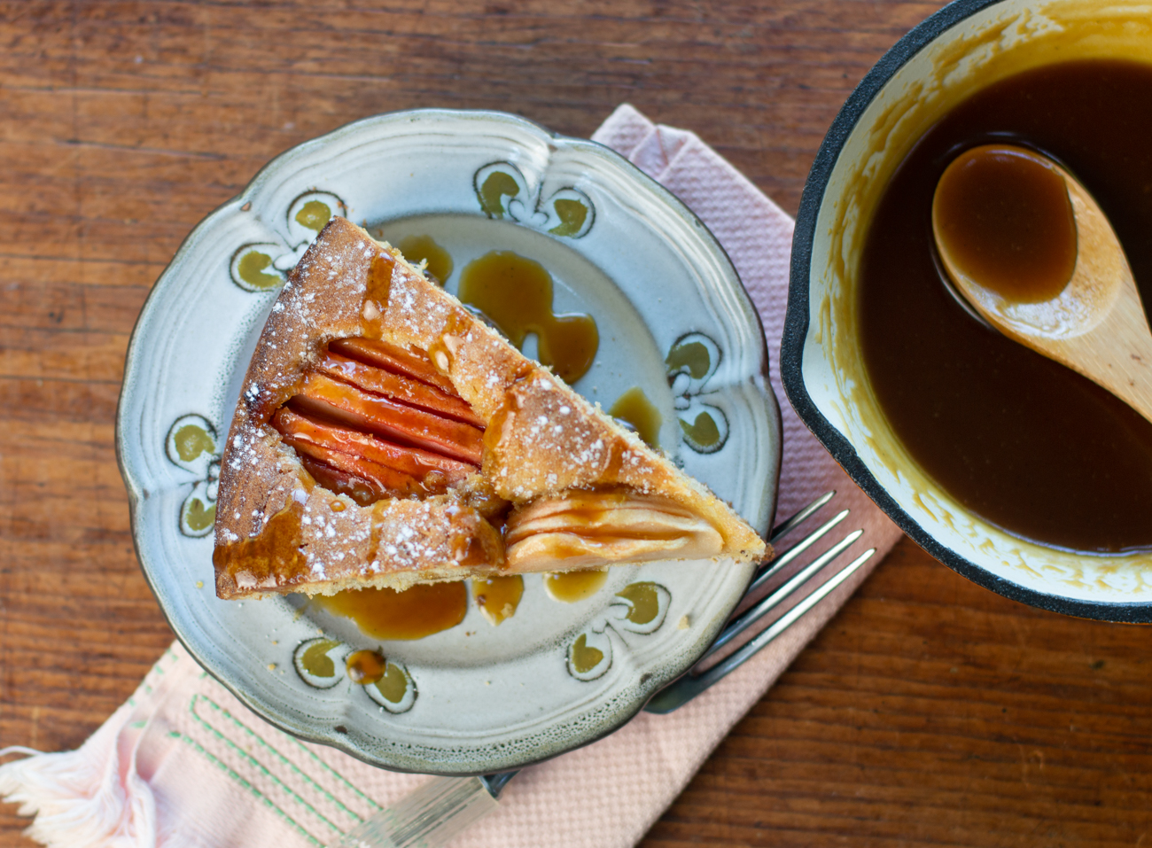 A slice of Karen's German Pink Pearl Apple Cake with a Maple Syrup Glaze