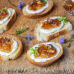 Karen's Chunky Apple Maple Jelly on Goat Cheese Crostini ~ I'm serving on a Vintage Cutting Board