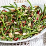 Haricot Vert with Garlic, Almonds, Pomegranate Seeds and Shiitake “Bacon” with Za’atar Seasoning recipe