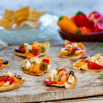 Mediterranean Slow-Baked Appetizer with Feta, Colorful Peppers, Olives & Garlic