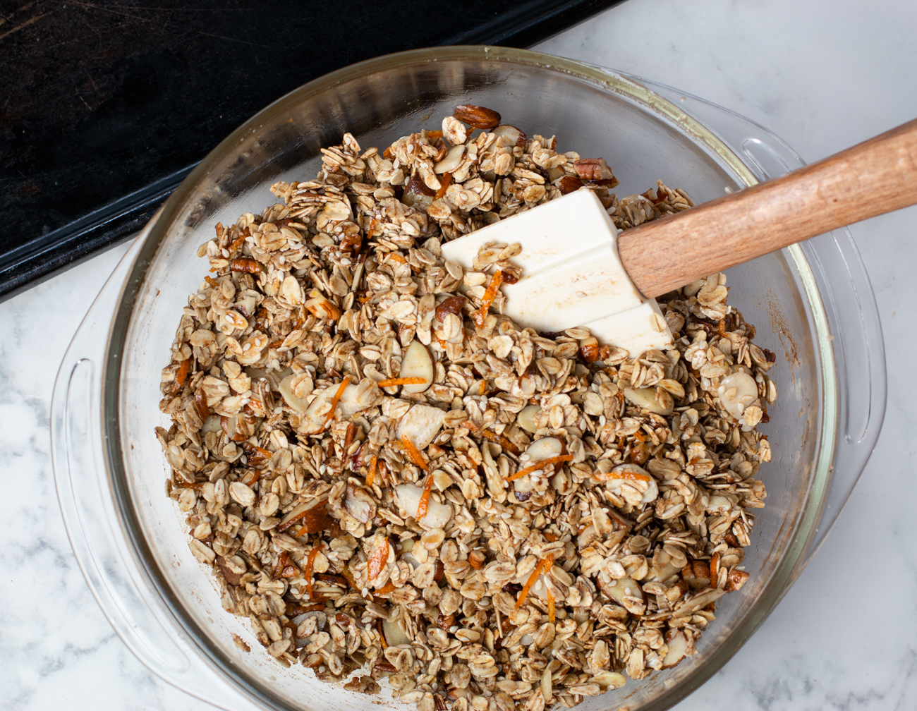 Natural Orange Oat & Nut Granola ready to smooth into the pan and bake