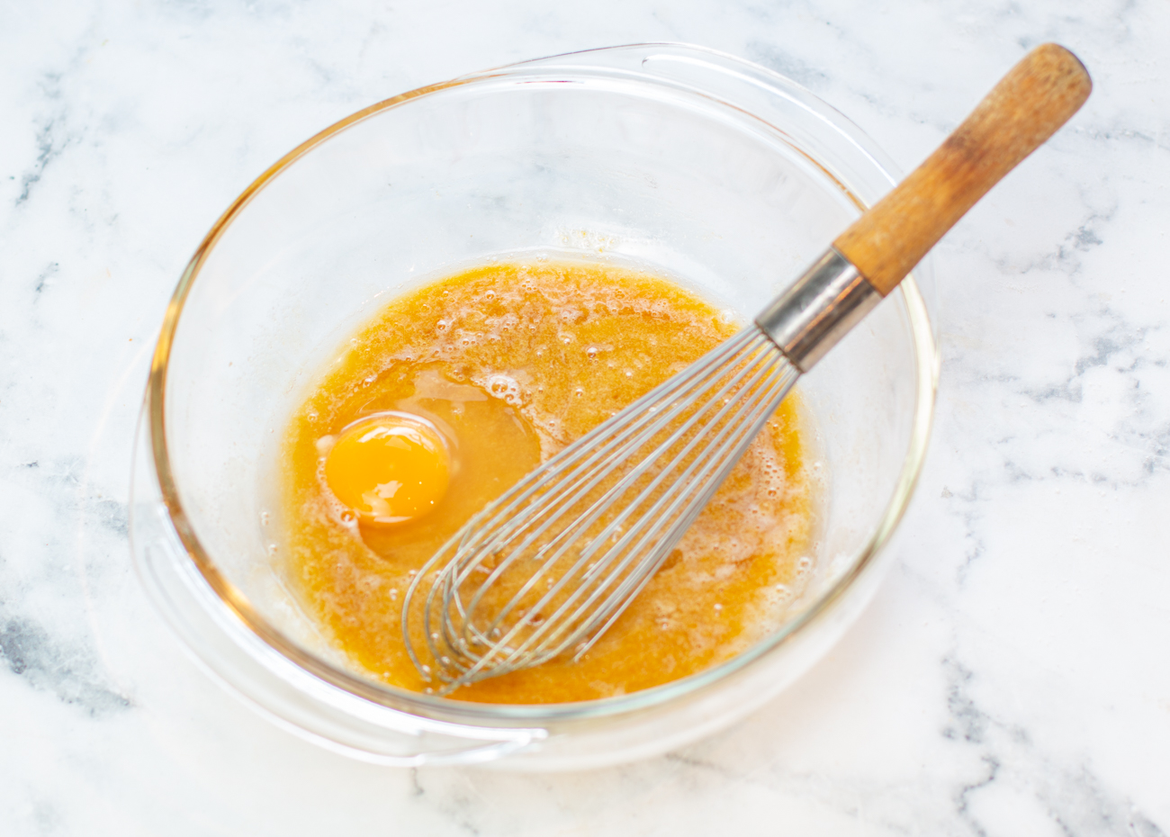 Whisk eggs and sugars together