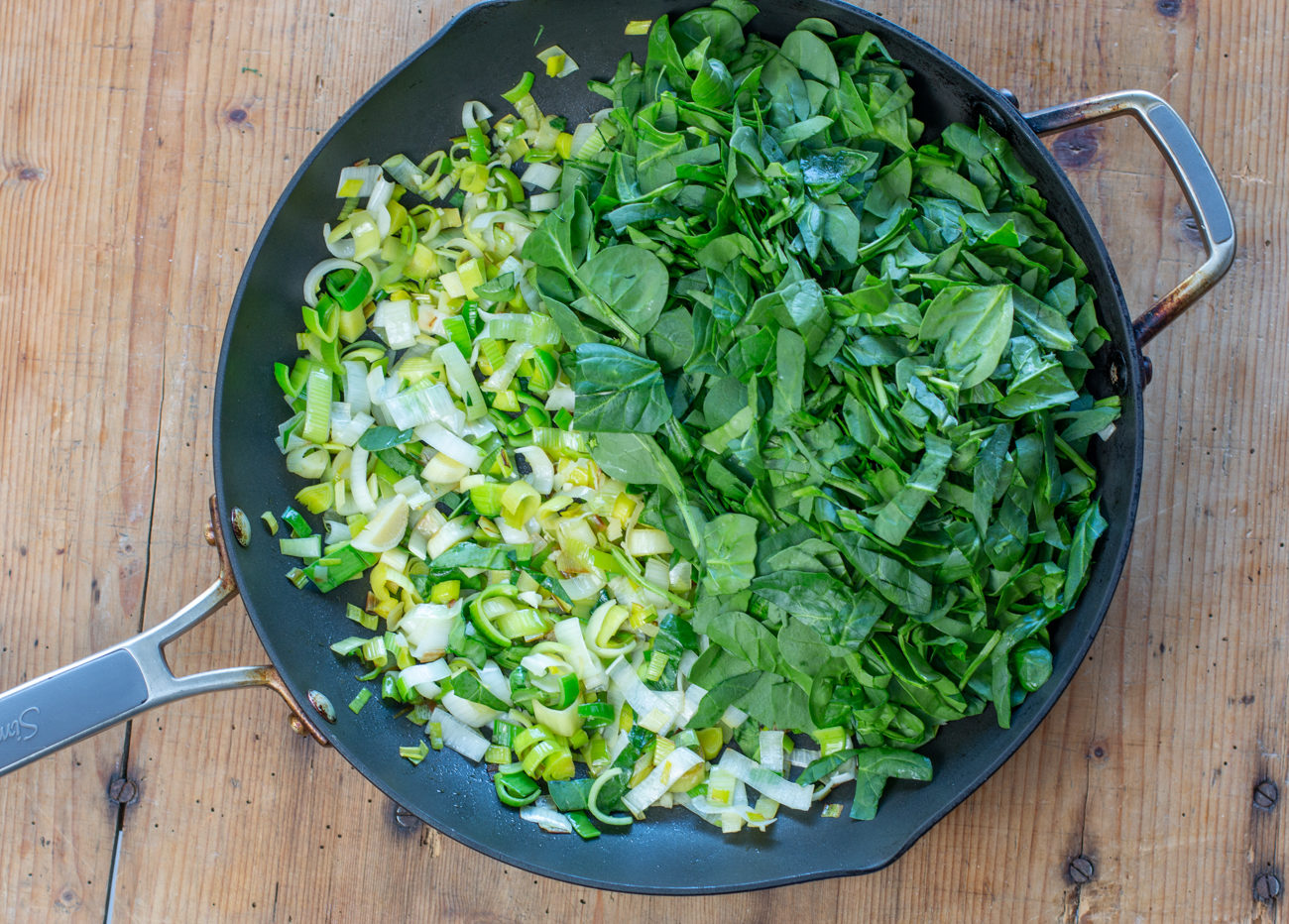 First, sauté leeks & garlic, then add all the spinach