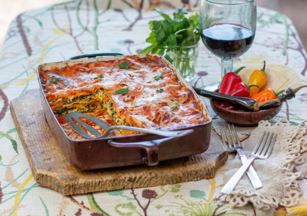 Gluten Free Corn Tortilla “Lasagne” with Green Veggies and Roasted Red Pepper Chile Sauce