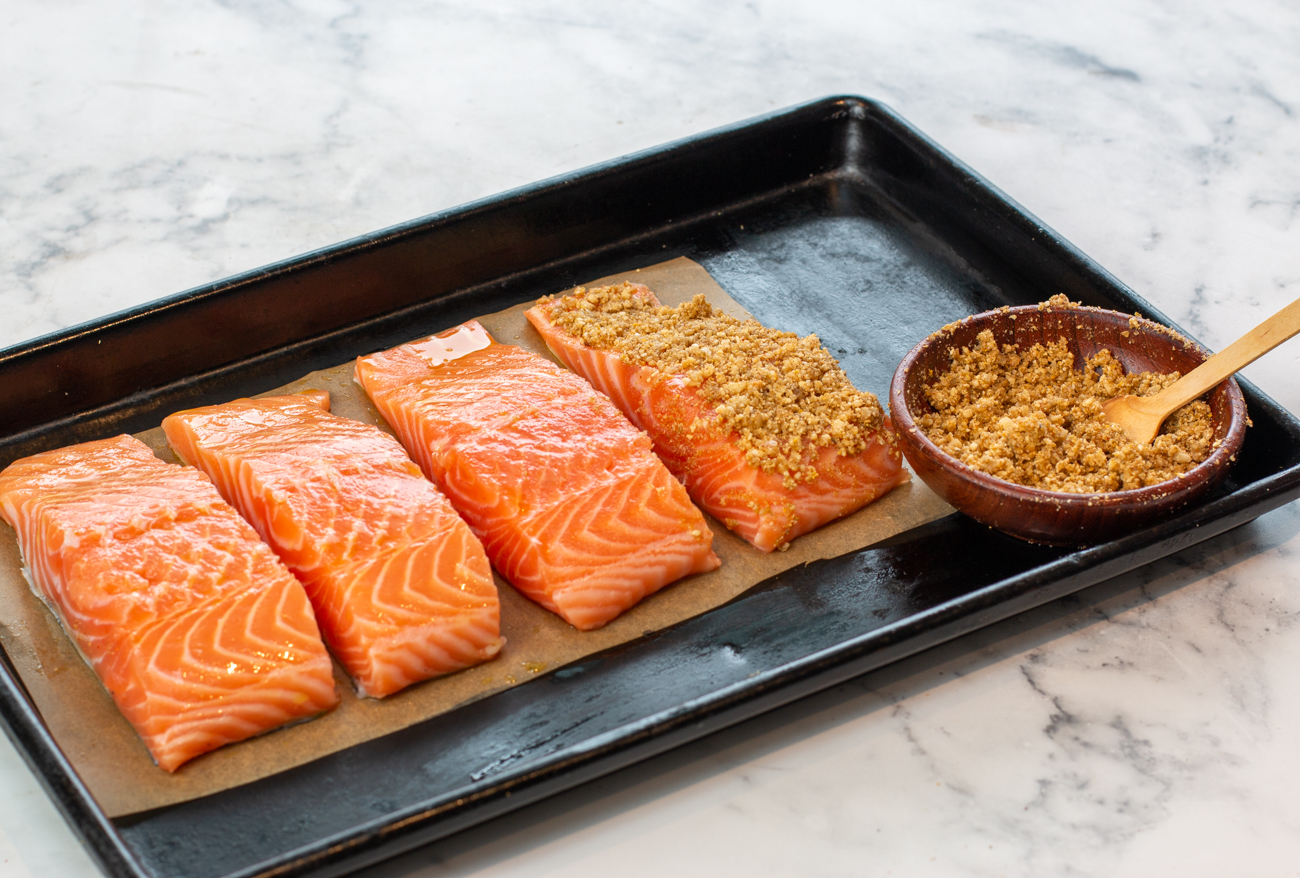 Add some Dukkah Seasoning on top of each piece of Salmon