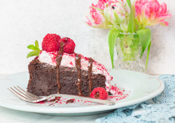 Flourless Chocolate Mousse Cake with Crushed Raspberry Coconut Whipped Cream