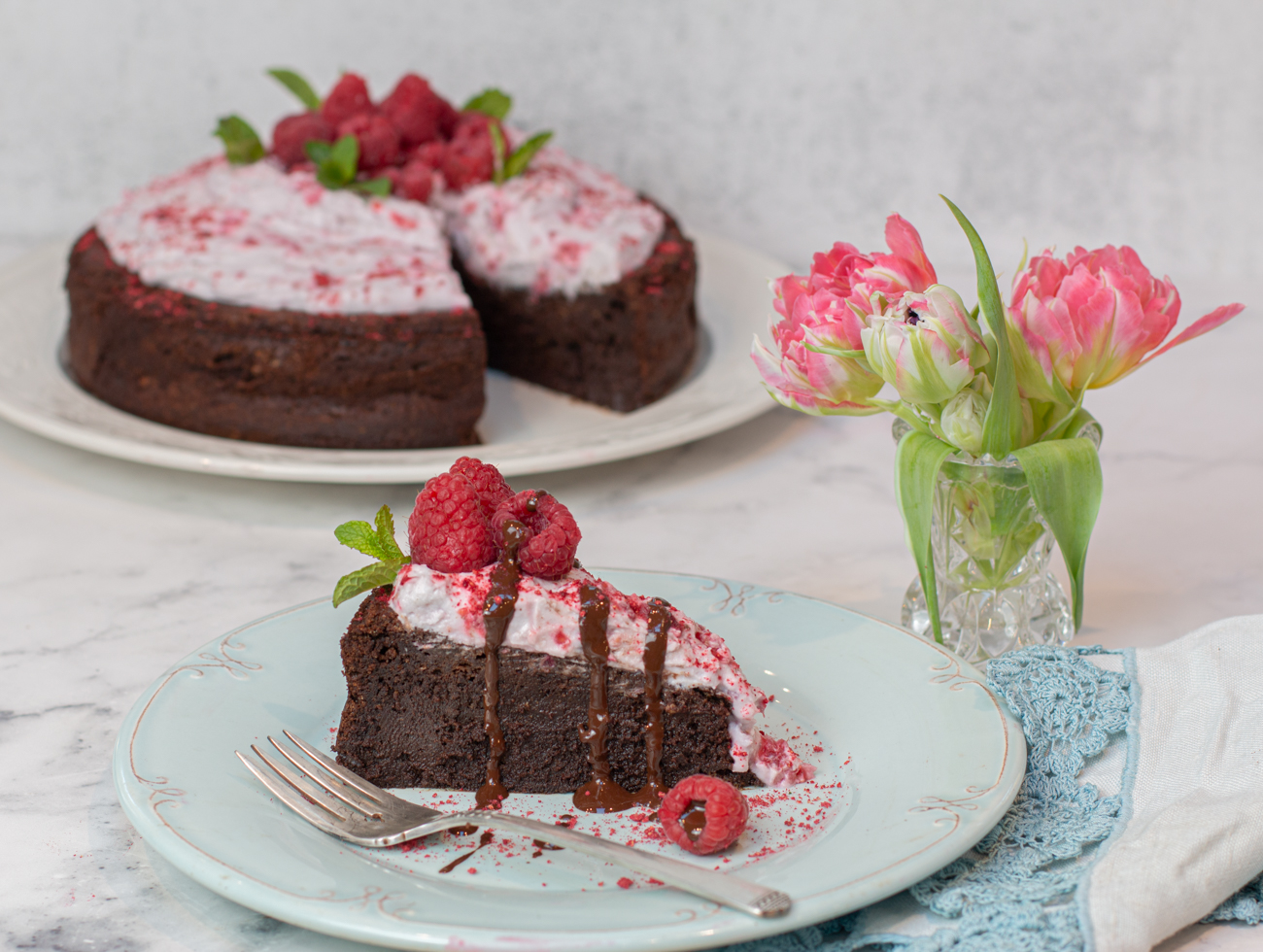 Flourless Chocolate Mousse Cake with Crushed Raspberry Coconut Whipped Cream