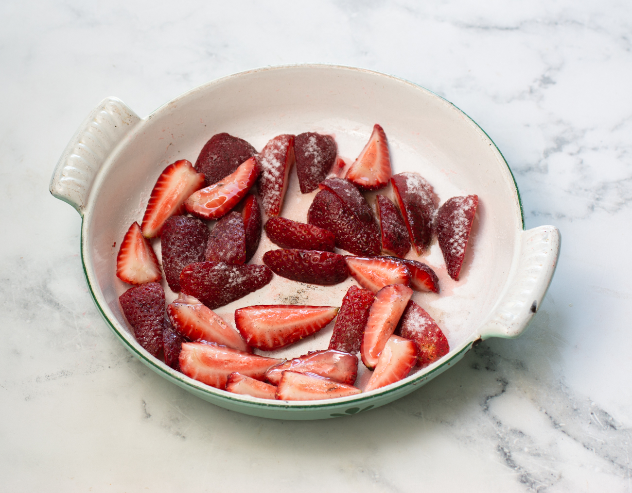 Place strawberries, sugar and vanilla bean gel in a 8" baking pan