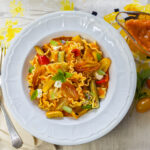 Golden Tomato Sauce with Mafaldine Pasta, Roasted Vegetables, Fresh Herbs and a touch of Goat Cheese