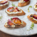 Roasted Plum Ricotta Crostini with Maple-Balsamic Glaze