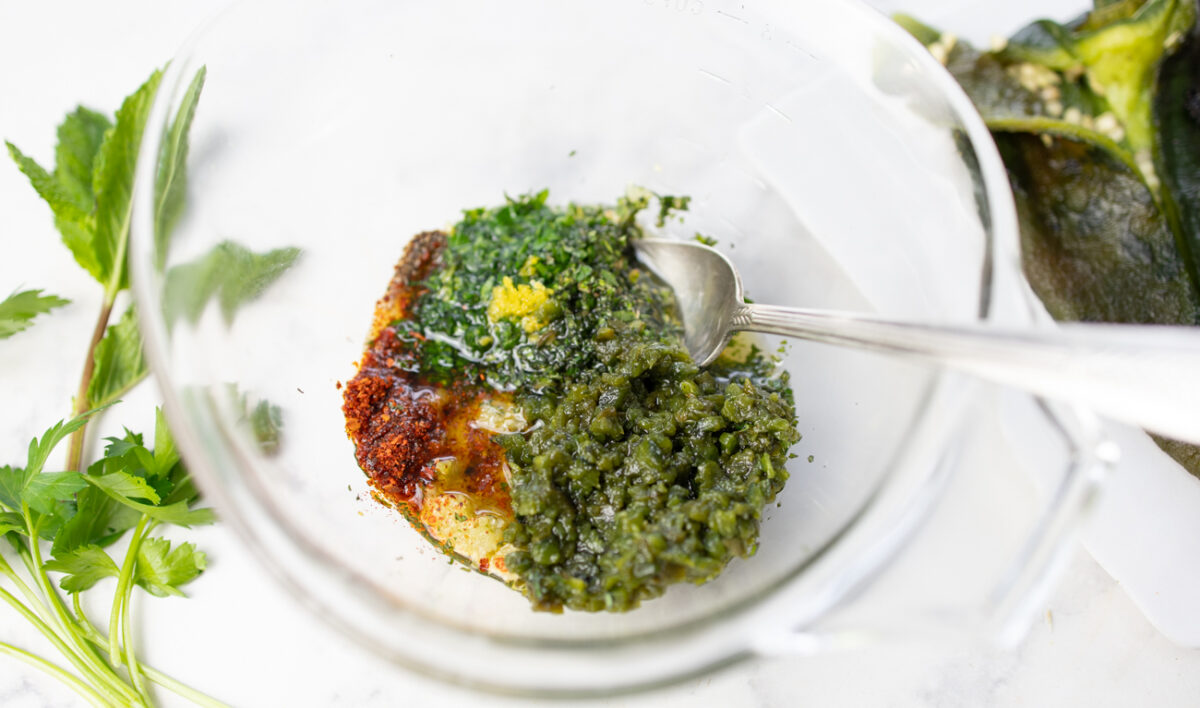 Mixing the ingredients for the Chimichurri