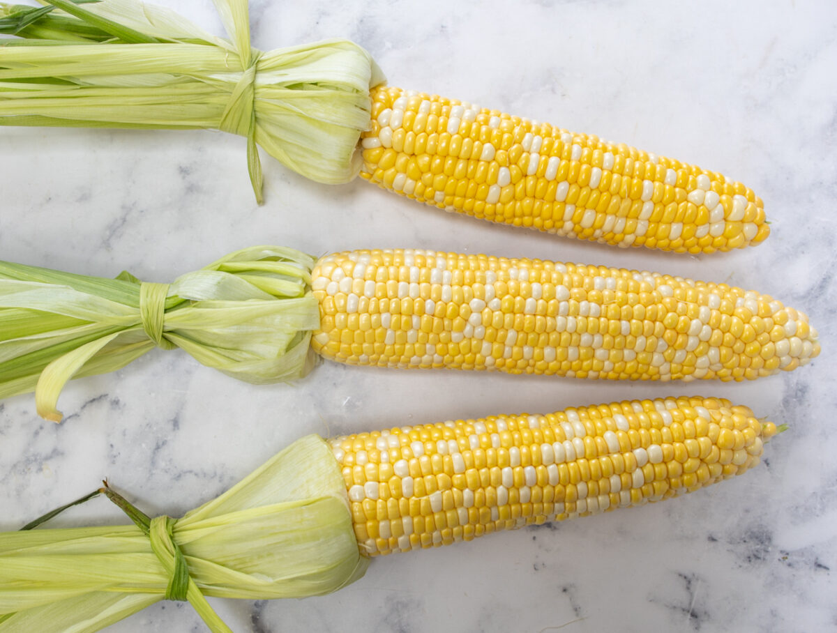 Corn: Grilled Mexican Street Corn Salad with Summer Vegetables and Spiced Crema