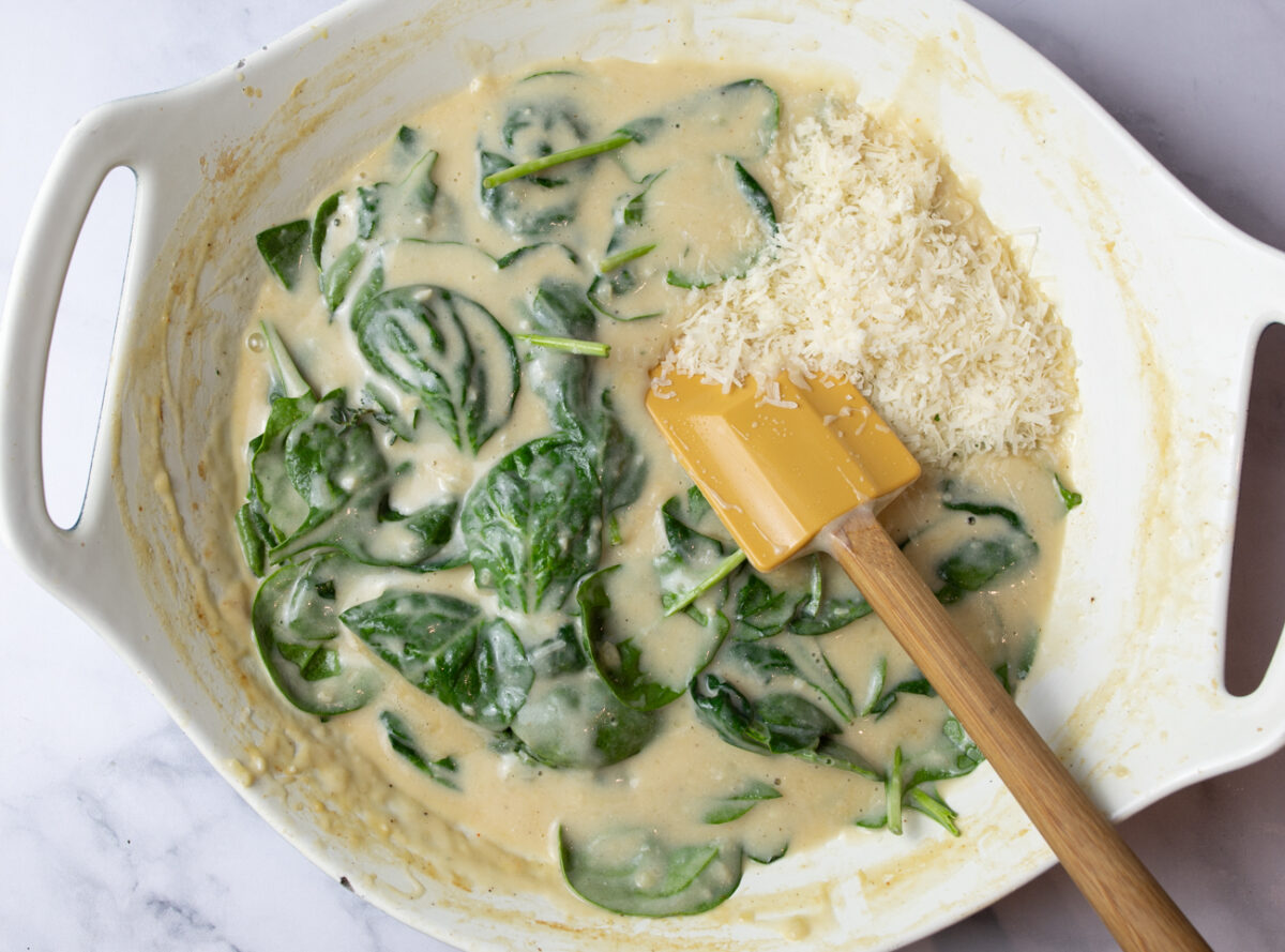 Fold in the lemon juice, grated Parmesan Cheese, Fresh Spinach and Sea Salt