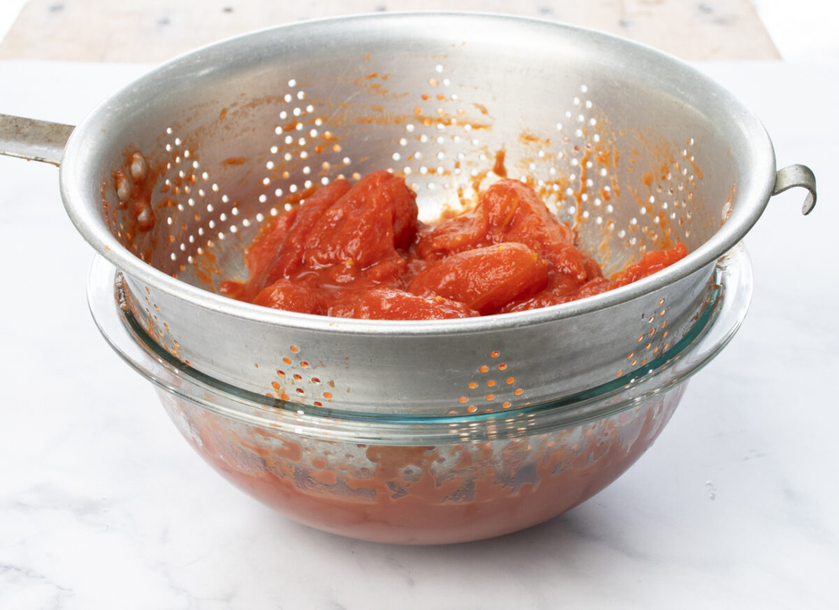 Straining the San Marzano tomatoes